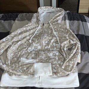 Cheetah print zip up jacket.